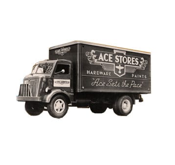 A vintage delivery truck with "ACE STORES Hardware Paints" and "Ace Sets the Pace" written on the side in white lettering. The truck has a boxy body and classic design features.