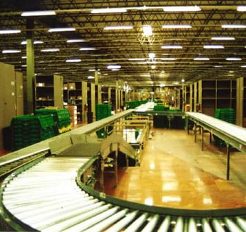 A conveyor belt in a warehouse.